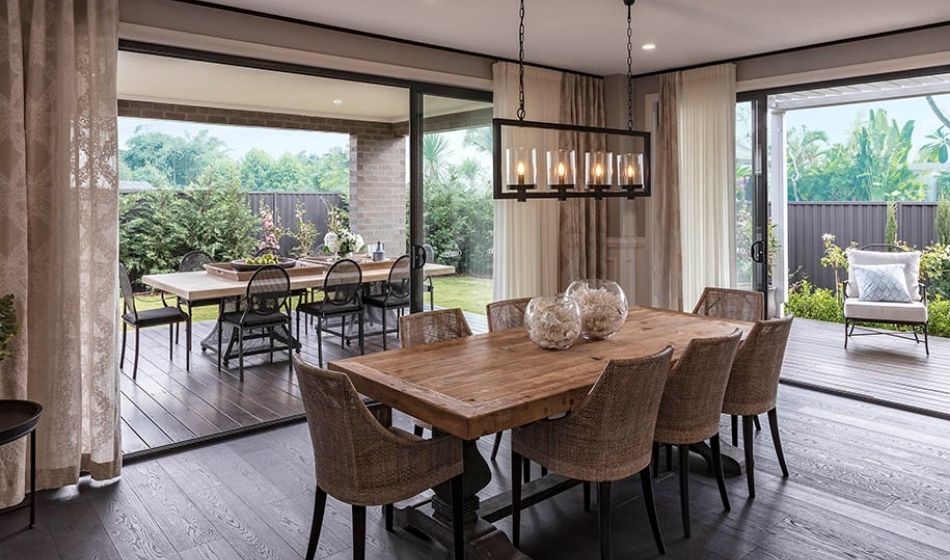 engineered-timber-flooring-vs-hybrid image of indoor and outdoor living areas featuring dark engineered timber flooring vs hybrid